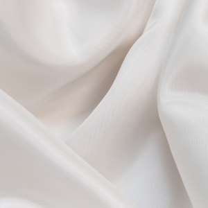Вискозный плательный подклад из брендовых стоковых коллекций теплого белого цвета.