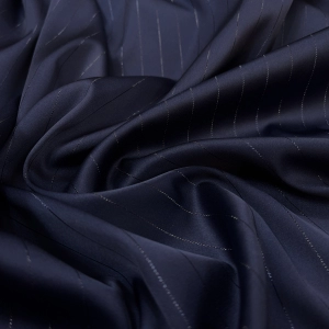 Атлас Армани темно-синего цвета с люрексовой продольной нитью. Атлас изумительного качества, струящийся, с матовым переливом как у натурального шёлка и с бархатистой изнанкой. Идеален для пошива вечерней рубашки, блузы, топа или платья.