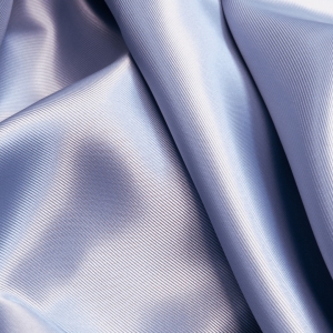 Вискозный костюмно-плательный подклад из брендовых стоковых коллекций серо-голубого цвета.