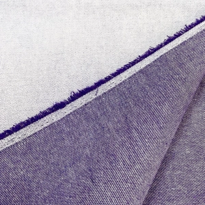 Двусторонний джинс с выраженным рубчиком фиолетового цвета. Подойдет для пошива летних джинс, куртки или юбки.
