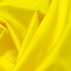 Плащевка Дюспо ярко-желтого цвета. Водоотталкивающая пропитка, можно шить демисезонные и зимние куртки на утеплителе.