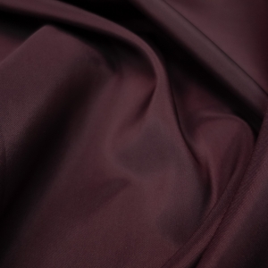 Плательно-костюмный подклад спокойного баклажанового цвета из итальянских фабричных коллекций. Полотно с эластаном , с матовой фактурой и полотняной выработкой.