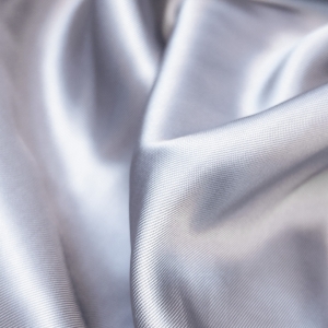 Вискозный костюмно-плательный подклад из брендовых стоковых коллекций серого цвета.